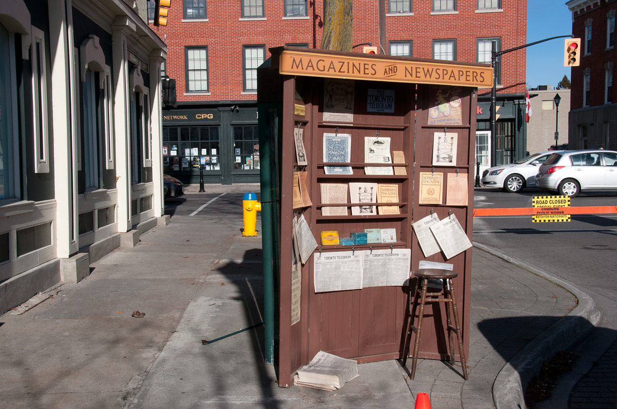 A prop on Third Street - newspaper stand covers Bell phone Booths