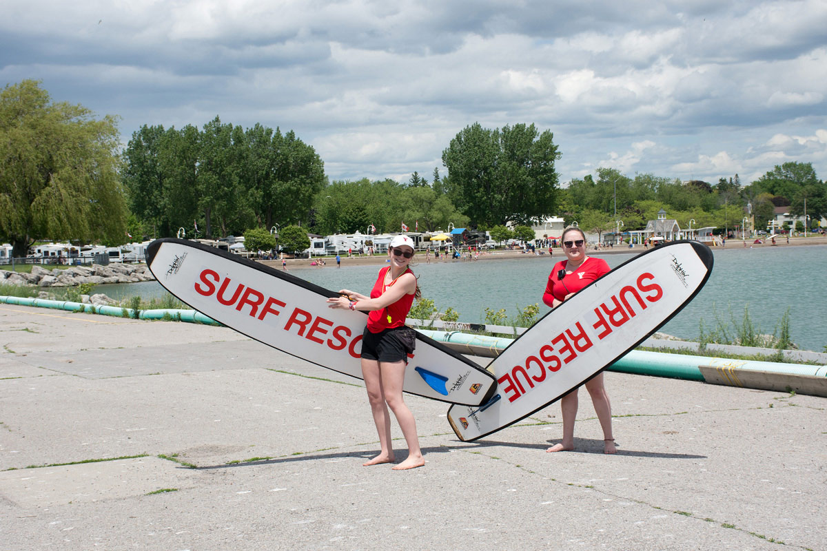 Lifeguards showing off their 'Surf Rescue' boards